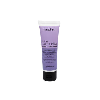 Huxter 50ml anti-bacterial hand sanitiser in purple duo with Cedarwood & Fig.  