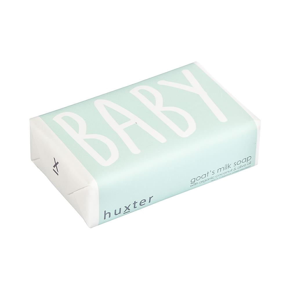 Huxter's Natural Goat's Milk Soap for baby with organic coconut and olive oil wrapped in pastel green. 