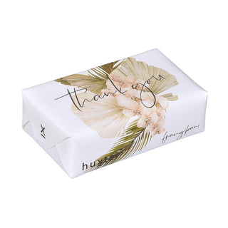 Huxter's Natural Frangipani soap wrapped in 'Orchids & Leaves - Thank you' cover