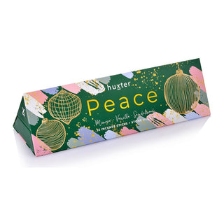 Huxter's Triangle bon bon green christmas baubles 'Peace' with 35 incense sticks inside, fragranced in mimosa, vanilla, and sandalwood