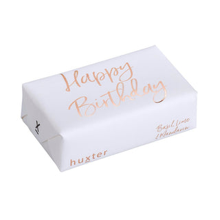 Huxter's Natural Basil, Lime, & Mandarin soap wrapped in 'Happy Birthday' with White Rose Gold Foil cover.