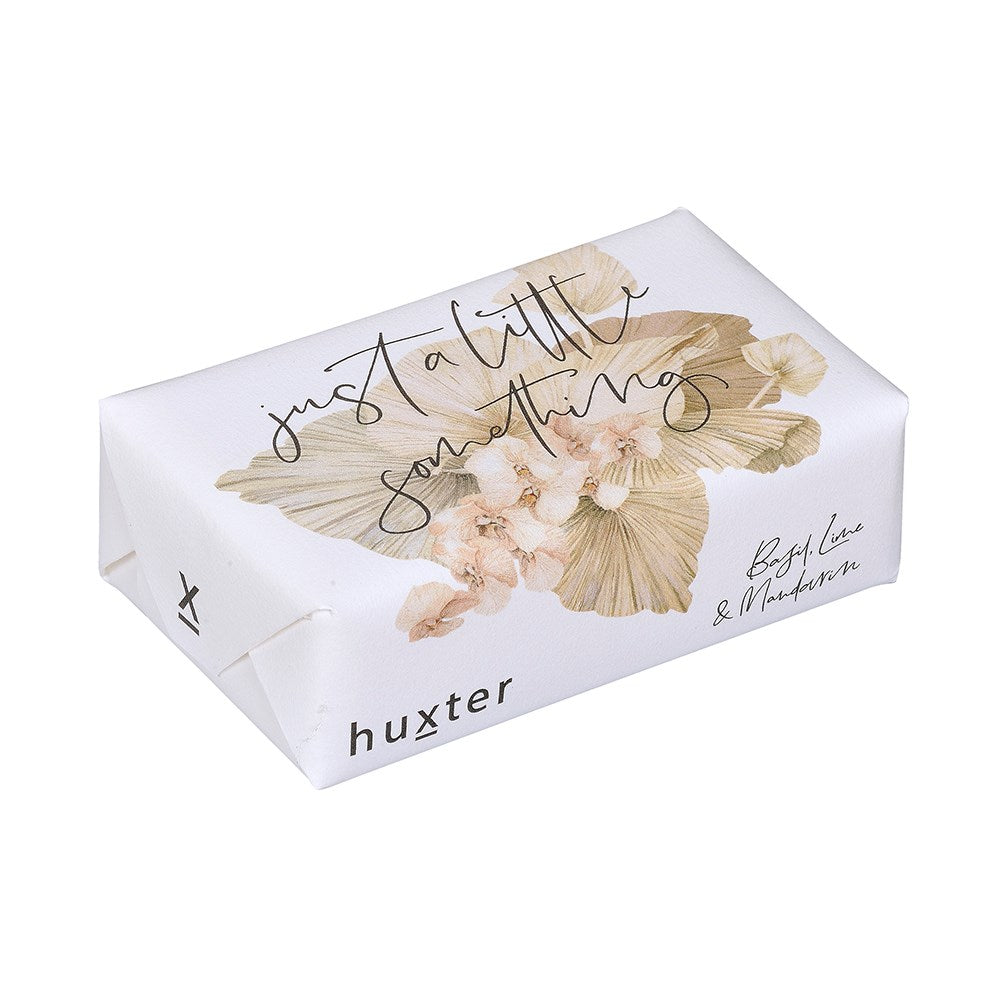 Huxter's Natural Basil, Lime, & Mandarin soap wrapped in 'Orchids & Leaves - Just a little something' cover.