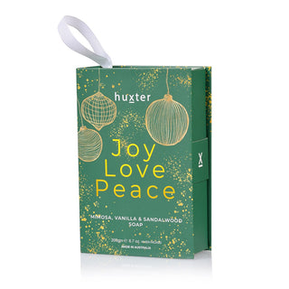 Huxter's 200gm soap book hanging in Green 'Joy, Love, Peace' with Xmas Baubles design, and with mimosa, vanilla & sandalwood scents.