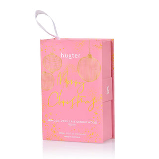 Huxter's 200gm soap book hanging in Pink 'Merry Christmas' with Xmas Baubles design, and with mimosa, vanilla & sandalwood scents.